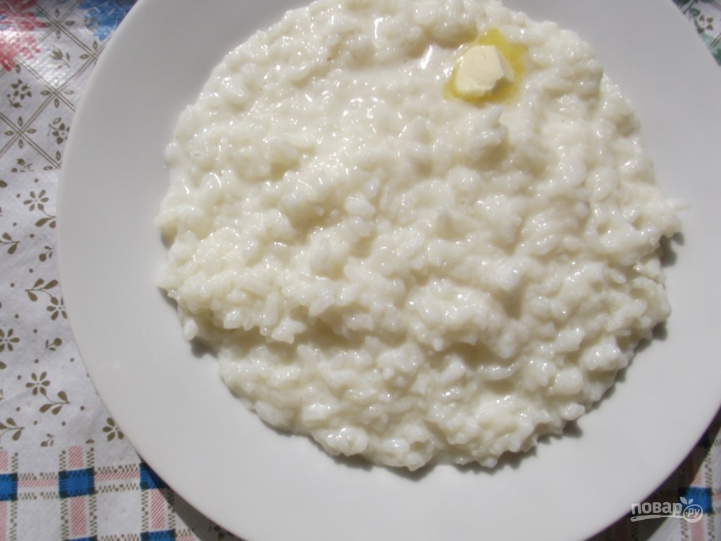 Готовая рисовая каша. Рисовая каша. Молочная рисовая каша на молоке. Рисовая каша на молокк. Каша риса рисовая на молоке.
